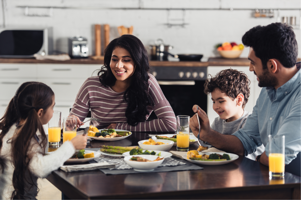 stock photo of a family eating a healthy meal together